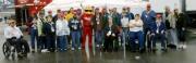 Our guests for the day posing with Firestone mascot Firehawk